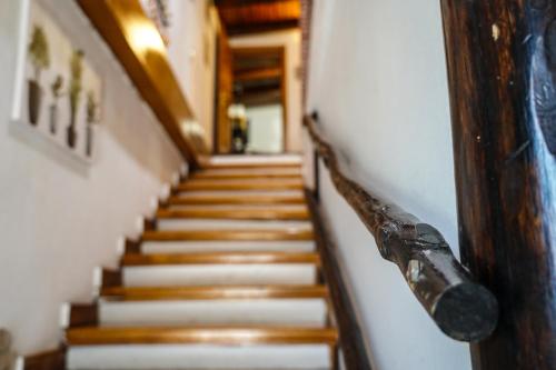 a hallway with stairs in a building at R-HOME Li Cuti in Catania
