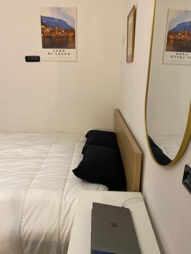 Cama o camas de una habitación en Lake Front Apartments, Lecco