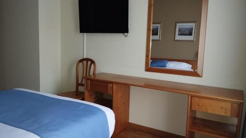 Postel nebo postele na pokoji v ubytování Hotel Covaleda Soria