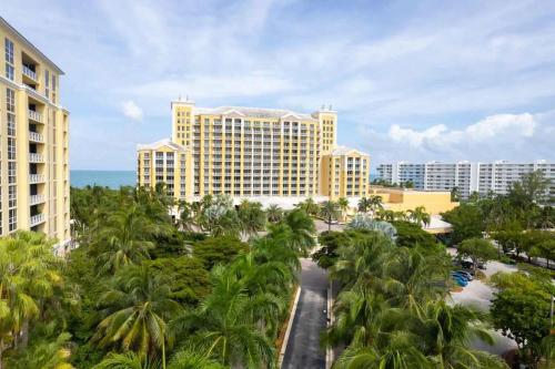 an aerial view of a resort with palm trees at The Palms, Ocean View Studio Located at Ritz Carlton - Key Biscayne in Miami
