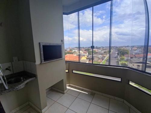 TV a/nebo společenská místnost v ubytování Apto central e pertinho do mar, melhor localização