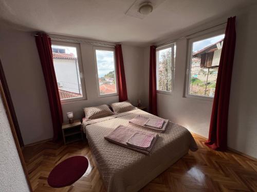 Ένα ή περισσότερα κρεβάτια σε δωμάτιο στο Apartments Misa Lake View
