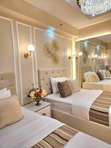 מיטה או מיטות בחדר ב-Jay Suite