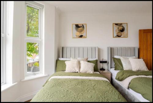 Postel nebo postele na pokoji v ubytování City Centre Maison