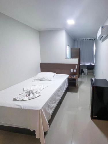 Katil atau katil-katil dalam bilik di Hotel Minas