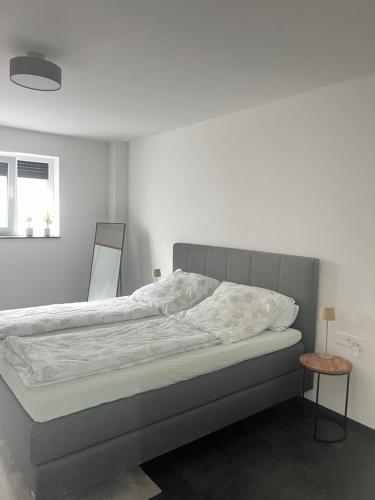 Ένα ή περισσότερα κρεβάτια σε δωμάτιο στο Wohnung in Blaubeuren, Seißen