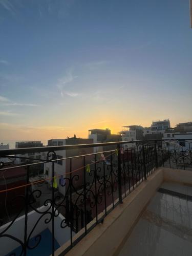 a view of a city skyline from a balcony at Sweet Taghazout Studios in Taghazout