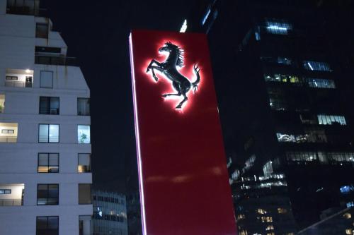 a red sign with a lizard on the side of a building at Polanco CARSO SOUMAYA in Mexico City