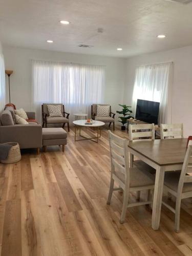 a living room with a couch and a table at University Casa Bonita in Tucson