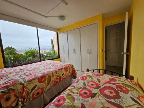 拉塞雷纳gran departamento para 11 personas en cuatro esquinas的海景客房 - 带两张床