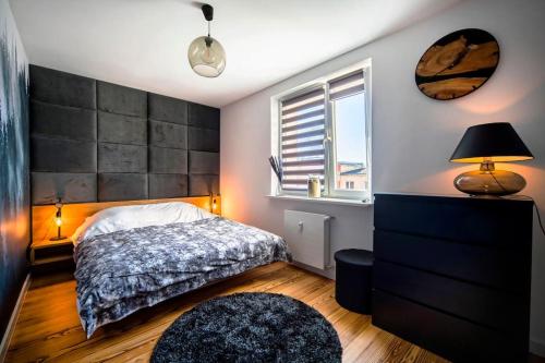 Ένα ή περισσότερα κρεβάτια σε δωμάτιο στο Luxury Apartment 88 m2, 3 bedrooms plus living room