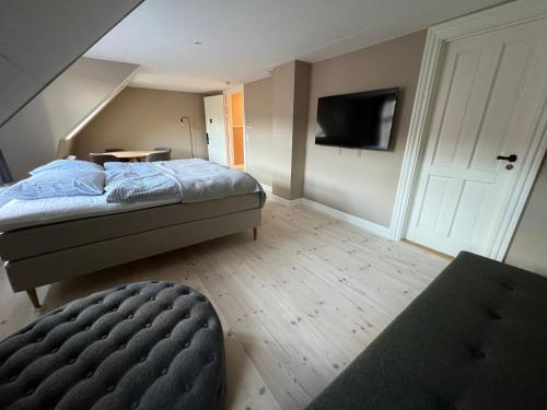 Postel nebo postele na pokoji v ubytování Byhuset - Penthouse