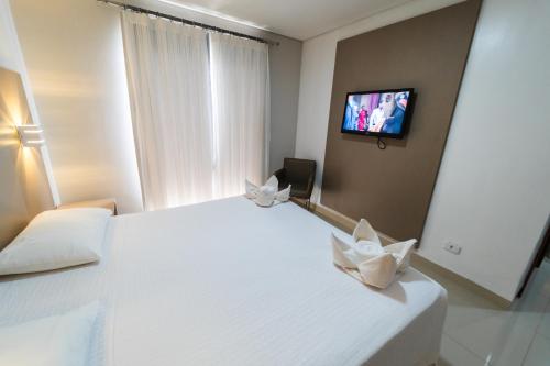 Katil atau katil-katil dalam bilik di Marruá Hotel