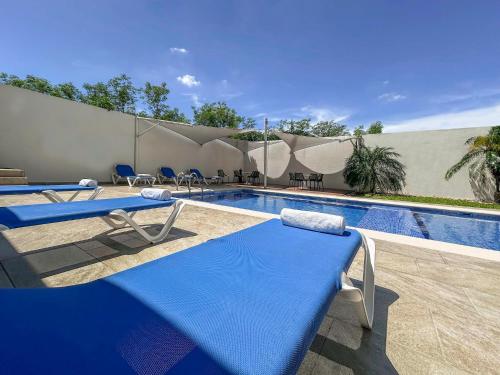 Bazén v ubytování Holiday Inn Express Mérida by IHG nebo v jeho okolí