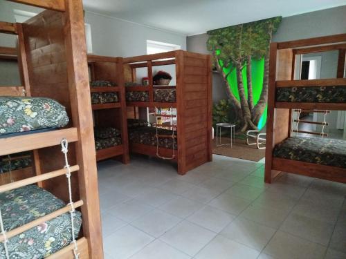 a room with bunk beds in a house at Orsa Maggiore Rifugio in Campoli Appennino