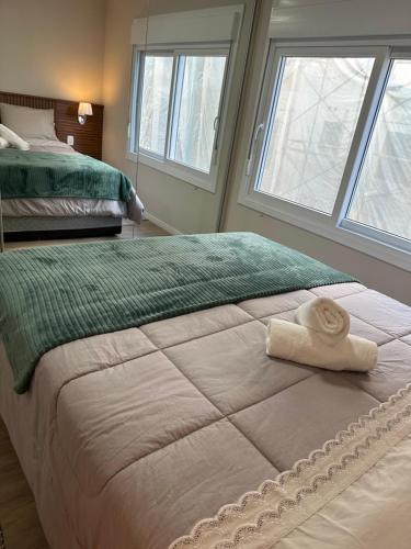 Un pat sau paturi într-o cameră la Apartamento acolhedor ideal para um casal