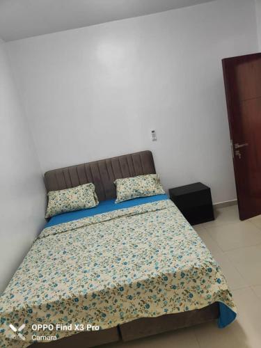 Katil atau katil-katil dalam bilik di Residence Khadija