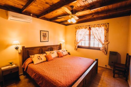Ένα ή περισσότερα κρεβάτια σε δωμάτιο στο Cabañas Steinhaus
