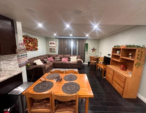 a living room with a couch and a table at Great Condominium Lower level in Salt Lake City