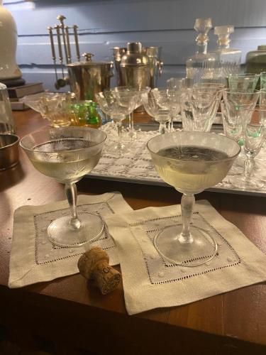 a table with two wine glasses on top of a table at Campito Loving in Higuey