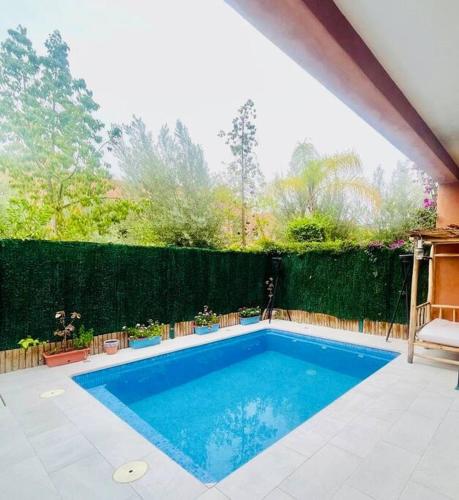 Bazén v ubytování Les Jardin d'Atlas golf and Waky with private Pool nebo v jeho okolí