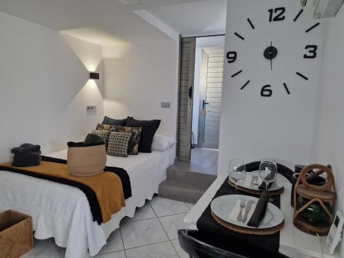 Giường trong phòng chung tại Ocean Surf Suite