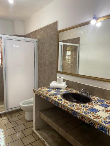 Koupelna v ubytování Casa Jarretaderas I