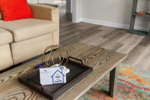 a living room with a coffee table and a couch at 10 Mins to Downtown Modern in Magic City- Unit A in Birmingham
