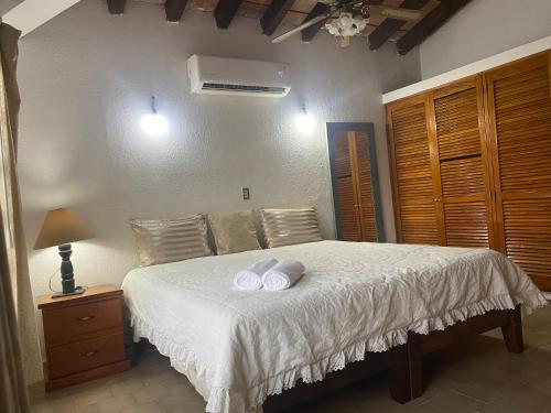 Ein Bett oder Betten in einem Zimmer der Unterkunft Casa Jarretaderas IV