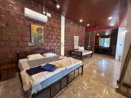 Ένα ή περισσότερα κρεβάτια σε δωμάτιο στο Palm Breeze Suites