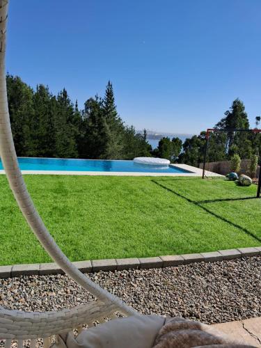 a hose is connected to a swimming pool at The sun in Tomé