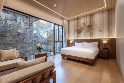 Ένα ή περισσότερα κρεβάτια σε δωμάτιο στο Sinae Residence