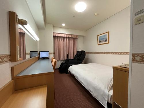 Postel nebo postele na pokoji v ubytování Hotel Alpha-One Miyoshi