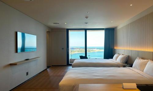 Ulsan Tanibay Hotel & Weddingにあるベッド