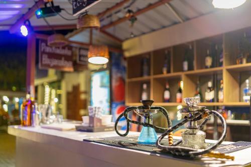 a bike sitting on a counter at a bar at Toshali Sands Nature Escape Puri in Puri