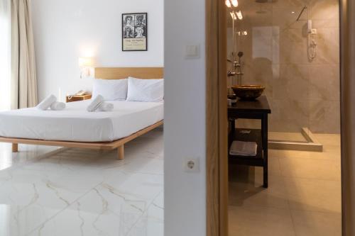 Кровать или кровати в номере Blue Bay Hotel