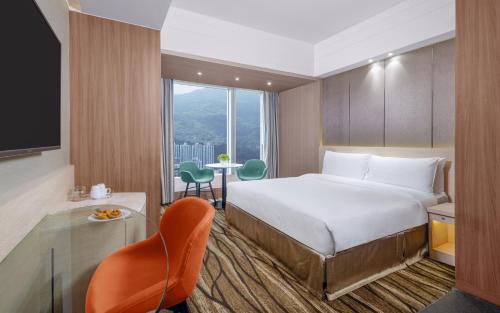 Postel nebo postele na pokoji v ubytování Nina Hotel Tsuen Wan West