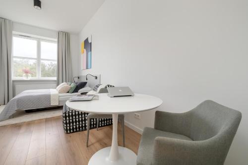 Posteľ alebo postele v izbe v ubytovaní Gagarina Warszawa Przytulne Studio by Noclegi Renters