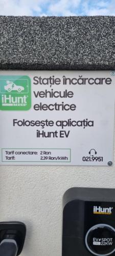 a sign on top of a vehicle electric vehicleipediaipediaipediaipediaipediaipediafficient at AmurResidence 64 Sauna Parking Barbeque in Iaşi