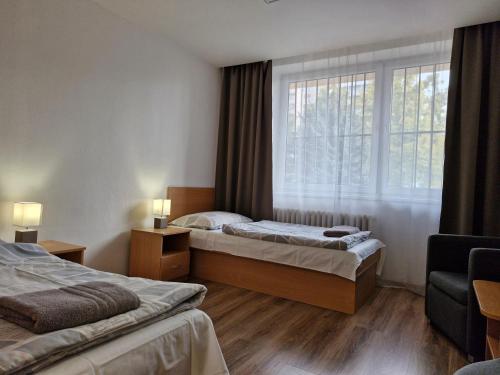 Postel nebo postele na pokoji v ubytování Studentsky domov B31