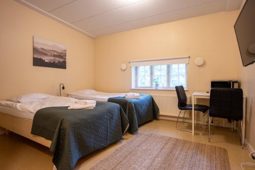 Postel nebo postele na pokoji v ubytování Kotimaailma Villa Hortus - Comfy Studio for 2