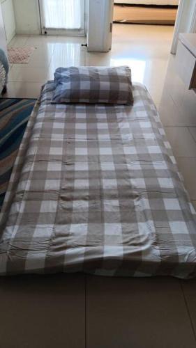 Katil atau katil-katil dalam bilik di PaRes Apt 2BR Unit 1 by eRJe