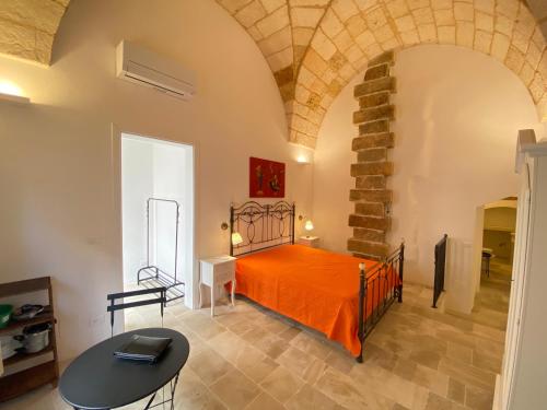 Ένα ή περισσότερα κρεβάτια σε δωμάτιο στο Residence Centro Castrignano