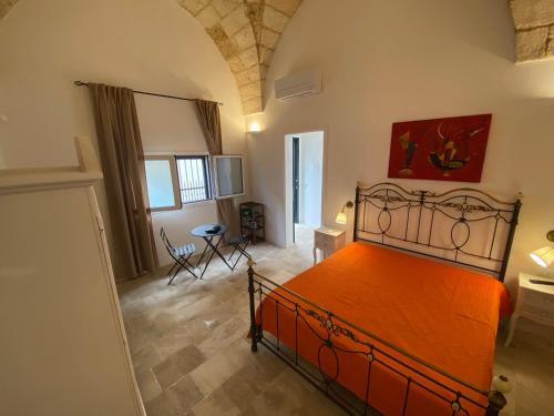 Ένα ή περισσότερα κρεβάτια σε δωμάτιο στο Residence Centro Castrignano
