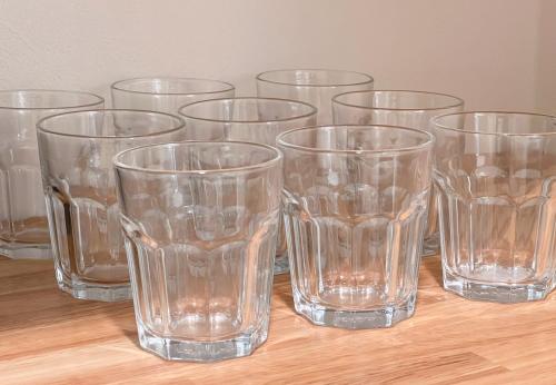a group of empty glasses sitting on a table at trias527 2-4 in Tokyo