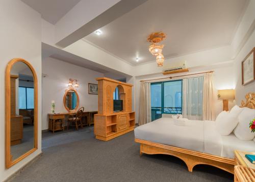 Postel nebo postele na pokoji v ubytování Green Nha Trang