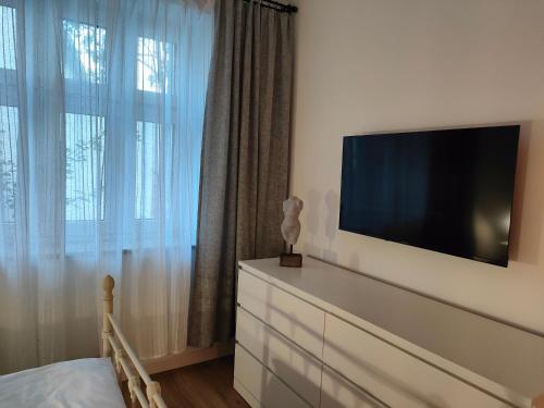 Televisyen dan/atau pusat hiburan di Apartamenty Dom Zielony