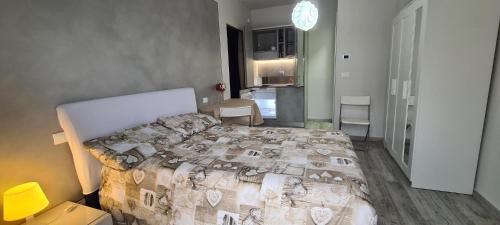 a bedroom with a large bed in a room at Villa Fiorita in Avigliana