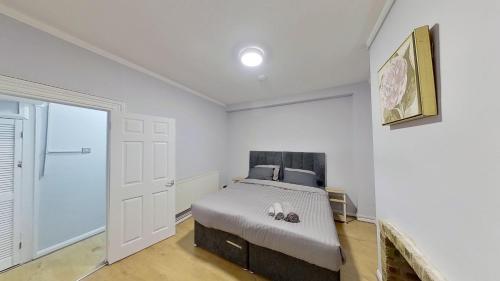 Ένα ή περισσότερα κρεβάτια σε δωμάτιο στο Grand 2 bed Apartment