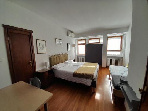 Posteľ alebo postele v izbe v ubytovaní Maison Giolitti